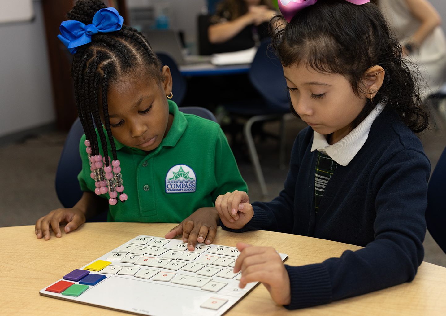Compass Orange Mound students practicing letters with a learning game
